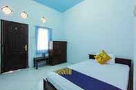Phòng ngủ SPOT ON 2288 Kost Mittasukha Family