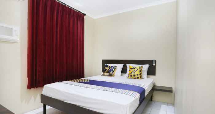 Kamar Tidur SPOT ON 2358 Aster Homestay