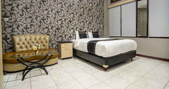 Kamar Tidur OYO 2469 Sutomo Homestay