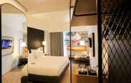 Bedroom 4 Luminor Hotel Purwokerto By WH