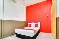 Bedroom OYO 89615 T Family Hotel