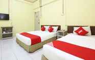 Kamar Tidur 2 Super OYO 89651 Harmoni Hotel