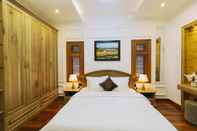 Phòng ngủ Villa Hoa Linh Lan