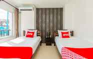 Kamar Tidur 4 Tang Cheng Holiday Hotel