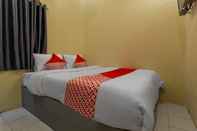 Bedroom OYO 2527 Hotel Triana