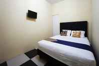 Kamar Tidur SPOT ON 2530 Tiga Mas Inn