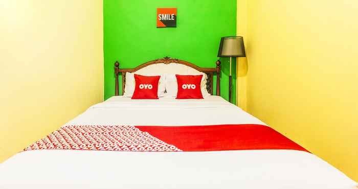 Kamar Tidur OYO 2165 Alyah Guest House Syariah