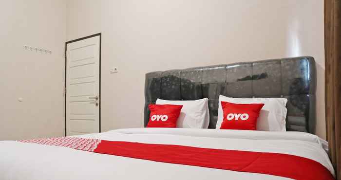 ห้องนอน OYO 2192 Hotel D'ostha Residence Syariah