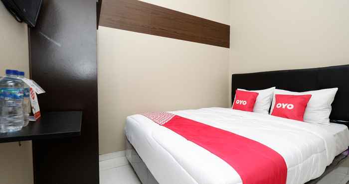 ห้องนอน OYO 2206 Penthouse Semarang