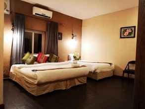 Kamar Tidur 4 Phonethip Plaza Hotel