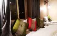 Kamar Tidur 5 Phonethip Plaza Hotel