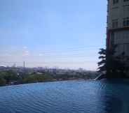 Swimming Pool 6 Apartemen Gunawangsa Merr by Rava Home