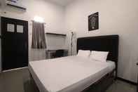 Bedroom OYO 2333 Kost Flamingo