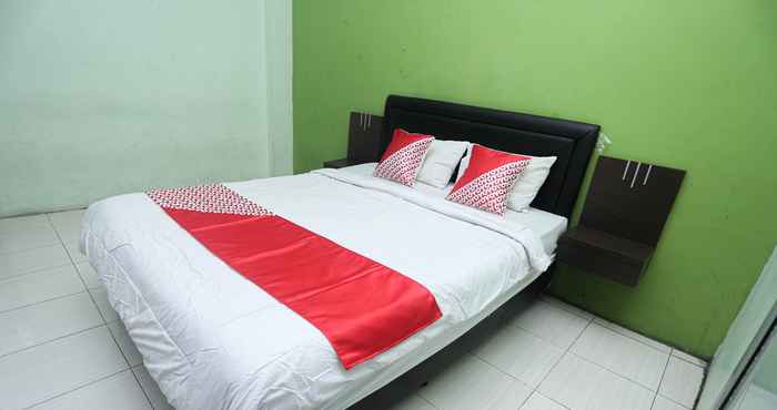 Bedroom OYO 2524 Royal Borneo Guesthouse