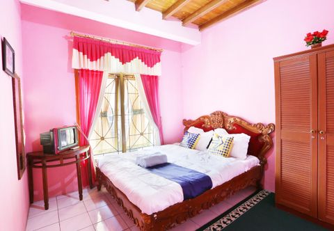 Bedroom SPOT ON 2514 Homestay Ortegha