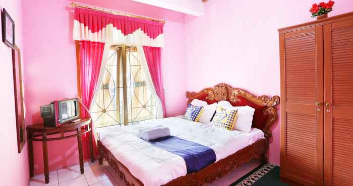 Bedroom SPOT ON 2514 Homestay Ortegha