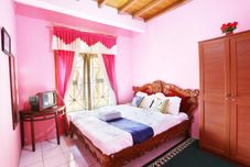 Bedroom SPOT ON 2514 Homestay Ortegha