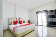 ห้องนอน OYO 2246 Anjung Bang Oking Hotel & Resort