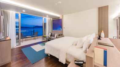 Kamar Tidur 4 Oceanfront Beach Resort