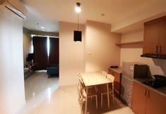 Bedroom 5 Apartemen Grand Kamala Lagoon Cozy by Bonzela Property