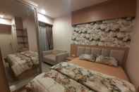 Bedroom Apartemen Grand Kamala Lagoon Cozy by Bonzela Property