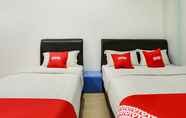 Bilik Tidur 2 SUPER OYO 89583 Grove Hotel