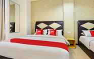 Kamar Tidur 4 SUPER OYO 89583 Grove Hotel