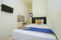 Bedroom SPOT ON 2219 Madina Residence Syariah