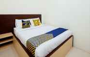 Kamar Tidur 2 SPOT ON 2220 Pink's Guest House