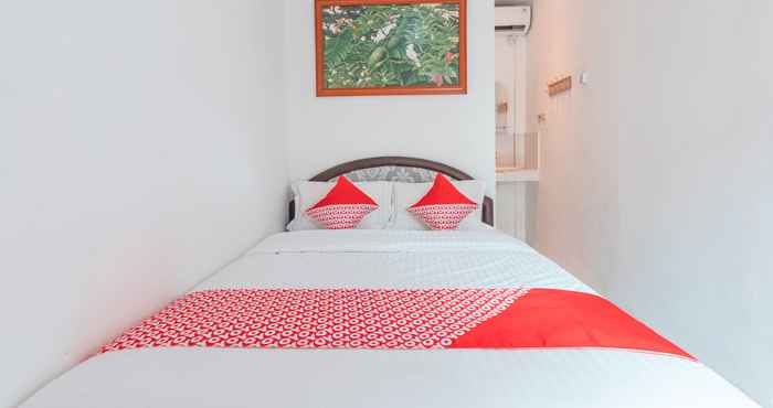 Kamar Tidur OYO 2229 Dolfie Residence