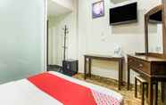 Kamar Tidur 5 OYO 89712 Grand Inn