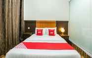 Kamar Tidur 2 OYO 89712 Grand Inn