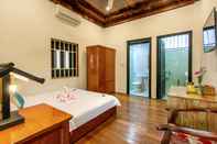 Phòng ngủ Flamingo Garden Homestay Hoian