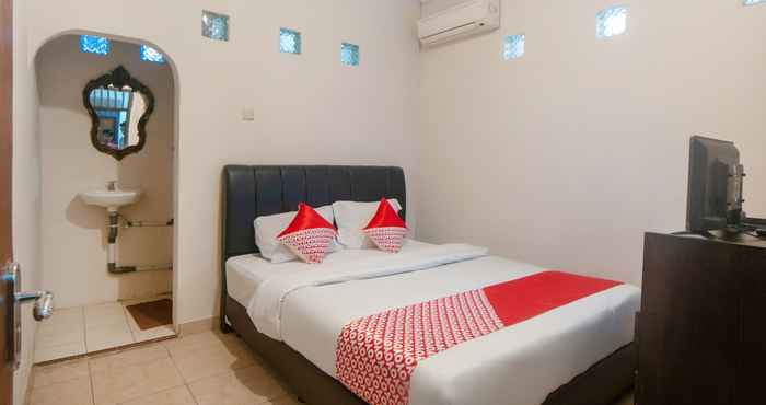 Kamar Tidur OYO 2256 Danysa Guesthouse Syariah