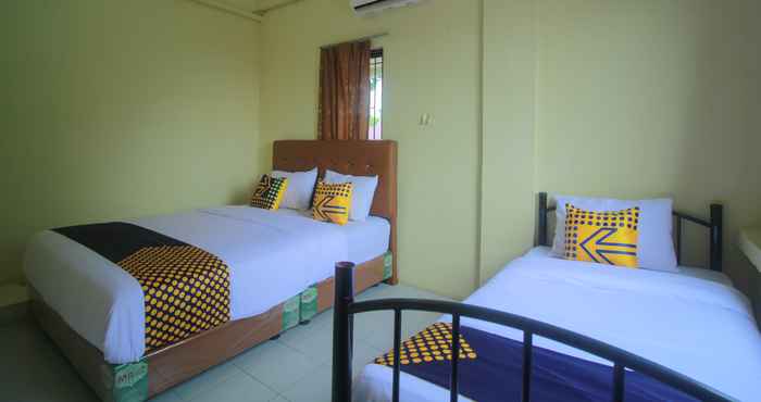 Bedroom SPOT ON 2305 Andys Nur Penginapan