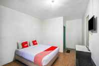 ห้องนอน OYO 2322 Dien Karona Hotel