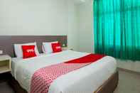 ห้องนอน OYO 2382 Wisata Hotel