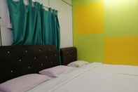 Bedroom SPOT ON 89788 Musafir Transit Hotel