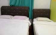 Bedroom 3 SPOT ON 89788 Musafir Transit Hotel