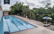 Swimming Pool 7 Studio Room at Apartemen Soekarno Hatta Malang by DHW