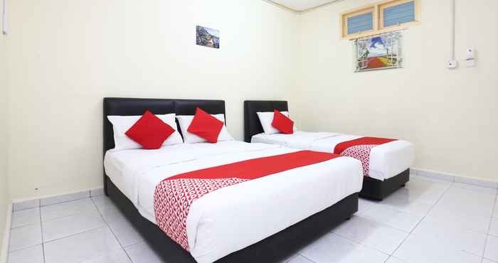 Phòng ngủ Super OYO 89640 Hotel Pelangi Marang