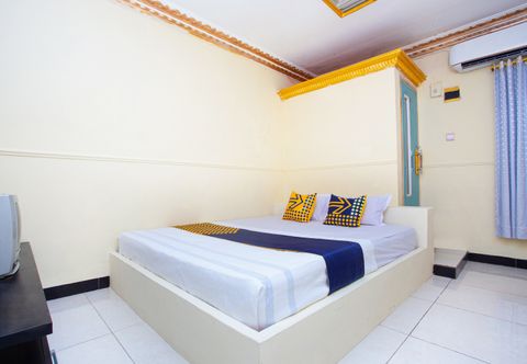 Bedroom SPOT ON 2473 Buana Jaya Residence