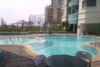 Swimming Pool 3BR Puri Kemayoran Apartment Jakarta with wifi 98m2 by Imelda