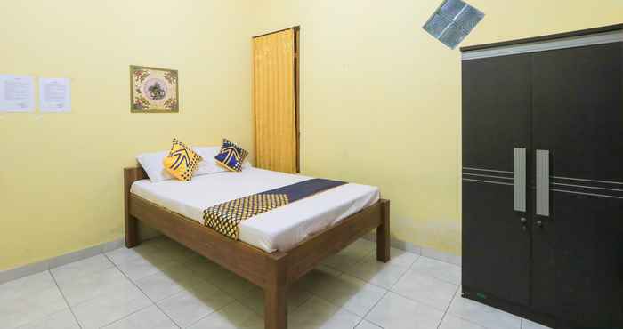 Bedroom SPOT ON 2440 Wallet Family Residence Syariah