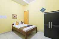 Bedroom SPOT ON 2440 Wallet Family Residence Syariah