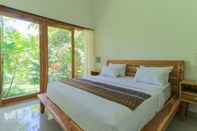 Kamar Tidur Palm Beach Villas Bali