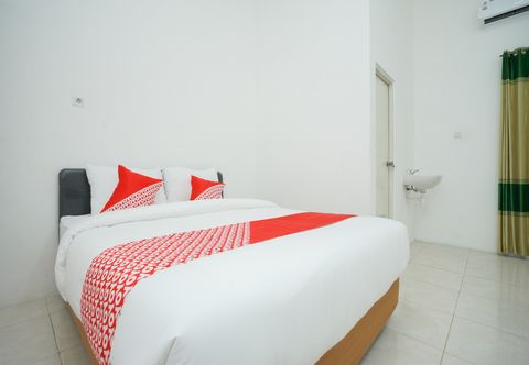 Bedroom OYO 2489 Choco 88 Residence