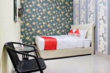 Bedroom Hotel O Jinan Makassar