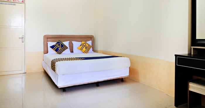 Bedroom SPOT ON 2610 ZN Guest House Makassar