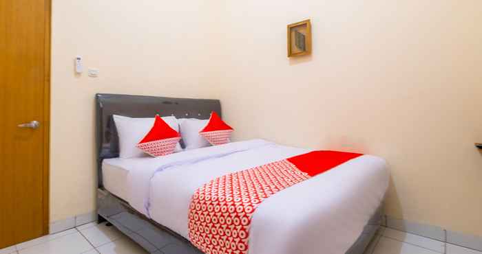 ห้องนอน OYO 2674 Siliwangi Guest House Syariah